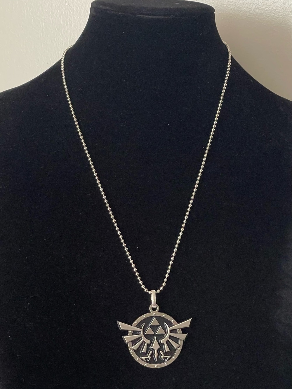 Silver The Legend of Zelda  Triforce pendant necklace. TM & 2008 Nintendo